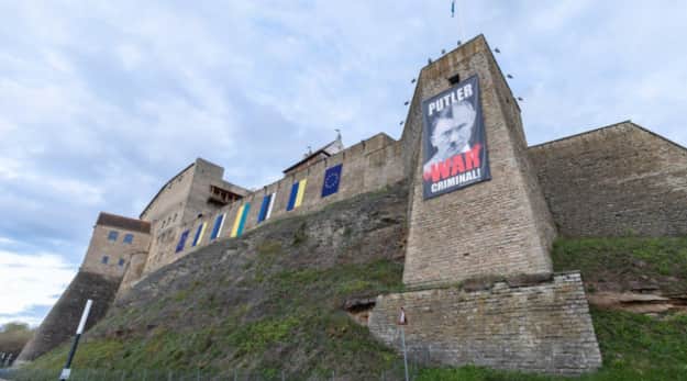 In Estonia on May 9, a poster with ‘Putler’ ‘was hung on the border from the Russian Federation